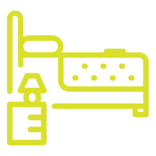 Yellow line icon of a bedroom setup with a bed, mattress, and bedside table with a lamp, symbolizing rest and recovery environment